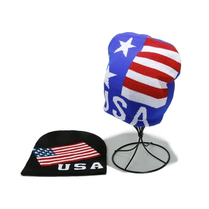 Knit American flag USA beanie hat with stars and stripes pattern in blue and black