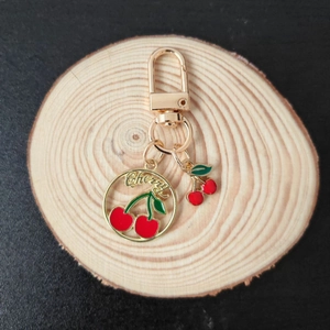 Creative gold metal cherry keychain with red enamel charms and engraved Cherry lettering