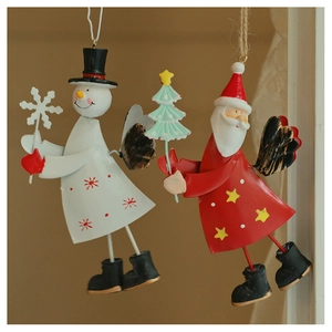 Detailed view of hand-painted metal Santa and snowman ornaments for Christmas tree decor