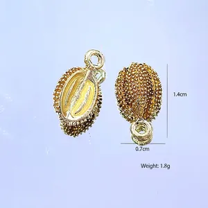 Macro detail of durian shaped gold alloy pendants for DIY jewelry with 1.8g weight
