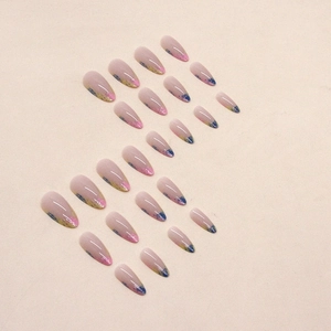 Glossy almond press-on nails with colorful abstract french tips on soft pink base
