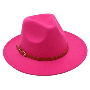 Detail of rose red fedora hat featuring a brown leather belt strap and gold buckle