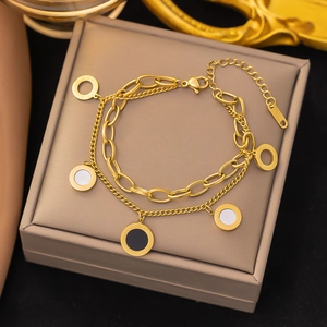 Double-layered 18k gold plated stainless steel bracelet with Roman numeral pendants
