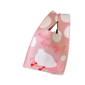Pink knit tote bag with white polka dots and cartoon duck for spring summer season