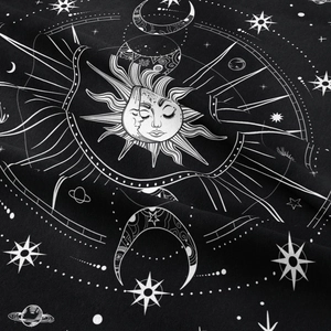 Detailed view of bohemian mandala tapestry featuring sun moon face and astrology patterns