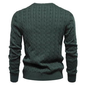 Detailed back view of dark green cable knit sweater with ribbed cuffs and hem