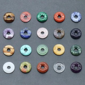 Selection of 20 natural crystal agate donut pendants in various healing stone materials