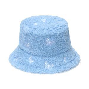 Light blue faux fur bucket hat featuring white butterfly embroidery for winter warmth
