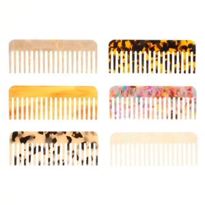 Set of six colorful acetate hair combs with marble and tortoiseshell patterns for curly hair