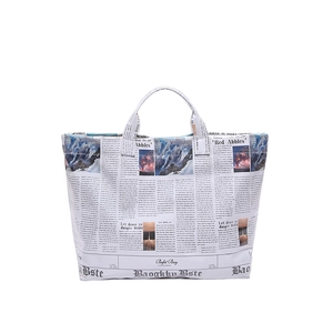 Stylish large capacity tote bag with vintage newspaper print and scenic illustrations