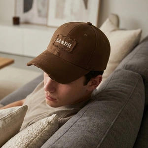 Distressed brown baseball cap with LA&DH embroidery and vintage cotton canvas texture