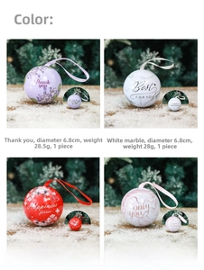 Macro view of 6.8cm tinplate candy sphere gift boxes with ribbons and marble patterns