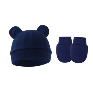 Detail view of dark blue baby beanie with ears and matching anti-scratch mittens set