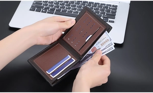 Detailed view of brown leather wallet with multiple card slots and cash compartment