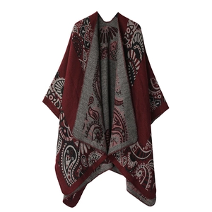 Detailed view of burgundy and grey paisley knit shawl with intricate ethnic patterns