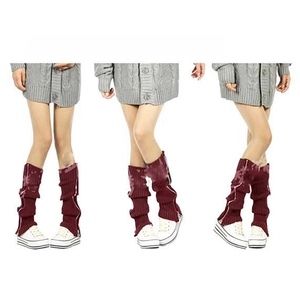 Detailed view of wine red knitted leg warmers with zipper and motorcycle style design