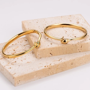 18K gold plated snake-shaped stainless steel open cuff bracelets with enamel eye detail