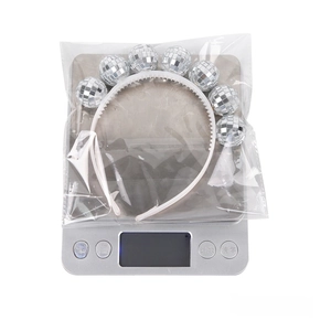 Detailed view of silver disco ball headband weighing 50.4g for party hair decoration