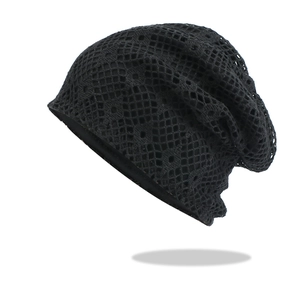 Minimalist black hollow knit beanie for women featuring a breathable mesh pattern design