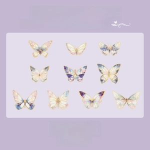 Detailed close-up of colorful PVC butterfly stickers for scrapbooking and journal decoration