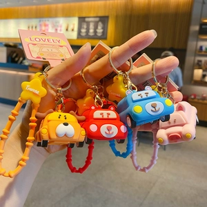 Set of four cute animal car silicone keychains including dog, bear and pig designs