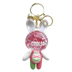 Pink acrylic bunny keychain with glitter rabbit charm and golden metal hook