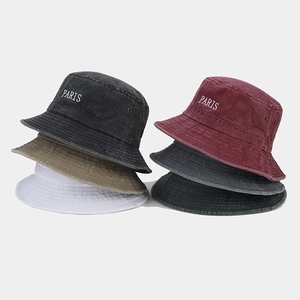 Washed cotton bucket hat with PARIS embroidery and metal eyelets for sun protection