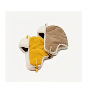 Winter plush trapper hats with fox ears in yellow and khaki corduroy with warm fleece lining