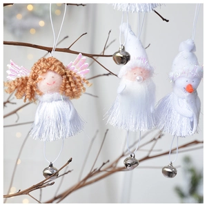 Detailed view of plush angel, Santa, and snowman Christmas ornaments with white tassels