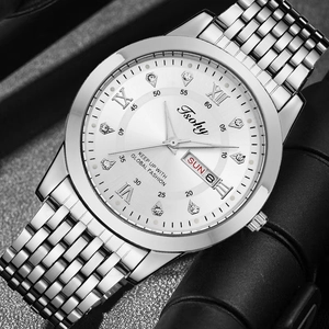Detail of silver business watch featuring sunray dial with day-date window and steel strap