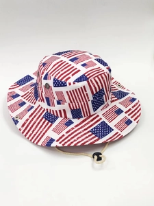 Detail of wide brim sun hat with US flag print, adjustable chin strap, and metal vents