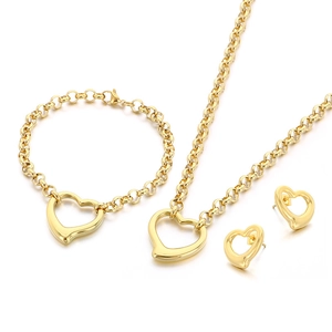 Golden stainless steel jewelry set featuring hollow heart necklace, bracelet, and earrings