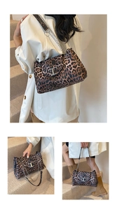 Detail of leopard print handbag with silver chain strap and metal T logo buckle