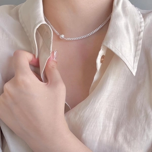 Minimalist 925 sterling silver beaded choker necklace shown on a female neck for daily wear