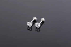 Detailed close-up of S925 silver stud earrings with screw-back and 4-prong zircon stones