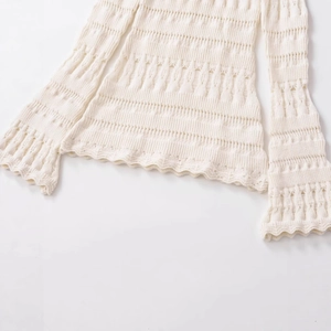 White hollow out knit sweater with bell sleeves and elegant scalloped hemline
