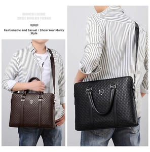 Detail of men's business briefcases with geometric embossing and adjustable shoulder straps