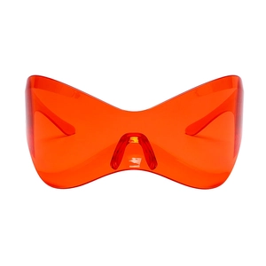 Front view of translucent orange oversized Y2K punk sports shield sunglasses with PC lens