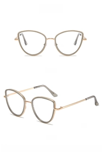 Front and 45-degree side view of cat-eye blue light blocking glasses in grey gold finish