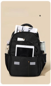 Front view of black large capacity backpack with multi-pocket storage for laptops and gear