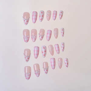 Pink almond press-on nails with 3D bows, pearls, strawberry art and plaid patterns