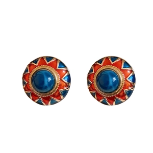 Vintage round enamel stud earrings with red and blue patterns and central gemstone
