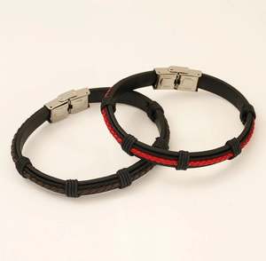 Detail of woven leather bracelets with stainless steel push buckles in black and red