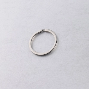 Close-up of a silver flat stainless steel split key ring for DIY keychain projects
