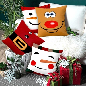 Lot de quatre housses de coussin de Noël avec motifs Père Noël, renne et bonhomme de neige