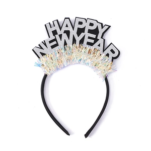 Detail of Happy New Year headband with silver glitter letters and colorful laser tinsel