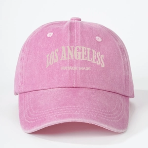Detail view of pink washed cotton baseball cap with Los Angeles vintage embroidery