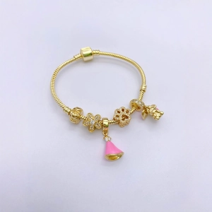 Christmas 18k gold plated bracelet with pink bell pendant and cat charms on white base