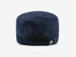Detail of winter thermal flat top hat featuring corduroy texture and metal adjustable buckle