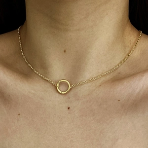 18K gold plated necklace featuring a colorful birthstone pendant on a female model